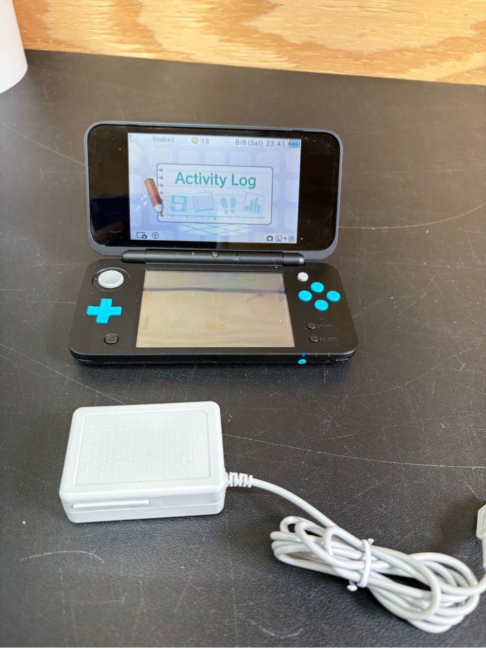 Nintendo 2DS XL Handheld Console - Black with Turquoise Buttons